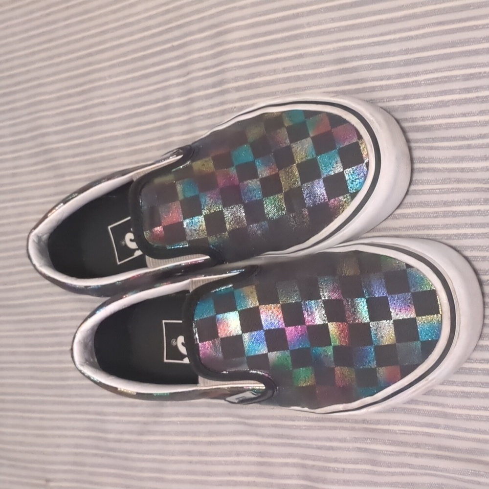 Vans classic slip-on sneakers, black with metallic rainbow checkers